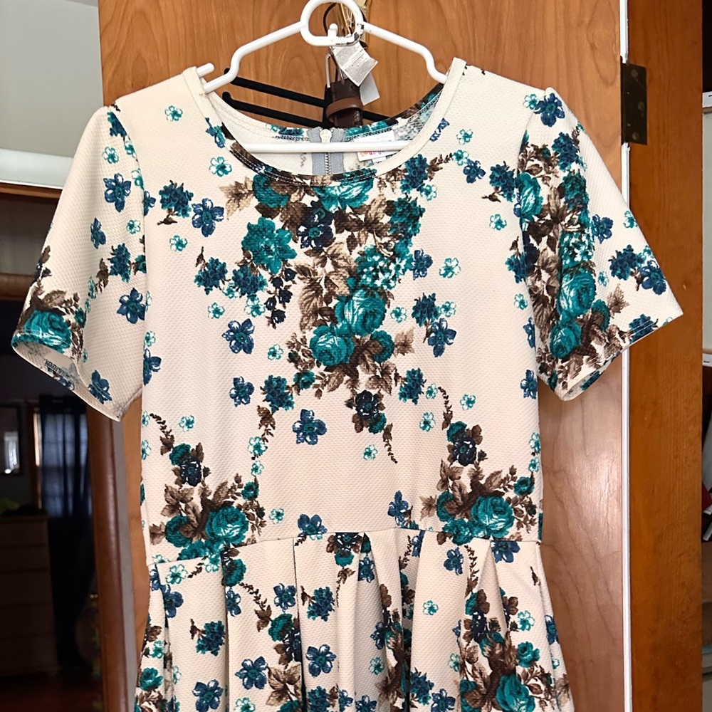 Lularoe Amelia dresses. Floral size xl and the other two size large EUC